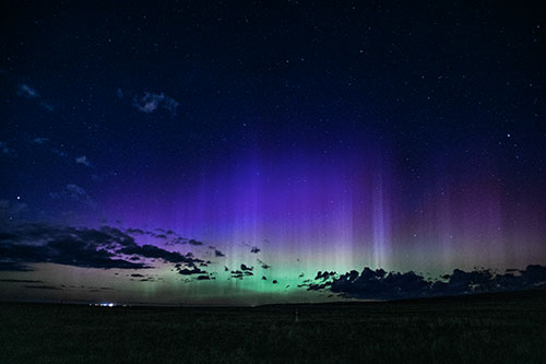 Northern Aurora Borealis Lights Up Night Sky (Blue Tint Photo)