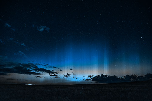 Northern Aurora Borealis Lights Up Night Sky (Blue Tone Photo)