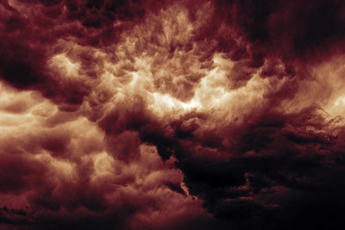 Raging Thunderstorm Clouds Brewing Among Sky