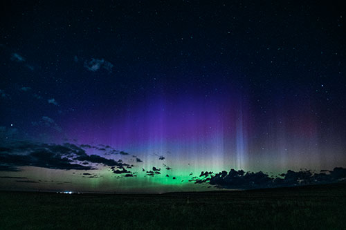 Northern Aurora Borealis Lights Up Night Sky (Cyan Tint Photo)