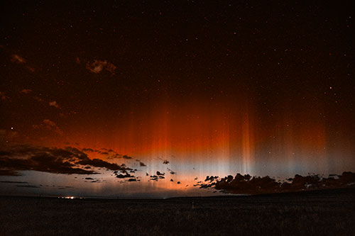 Northern Aurora Borealis Lights Up Night Sky (Orange Tone Photo)