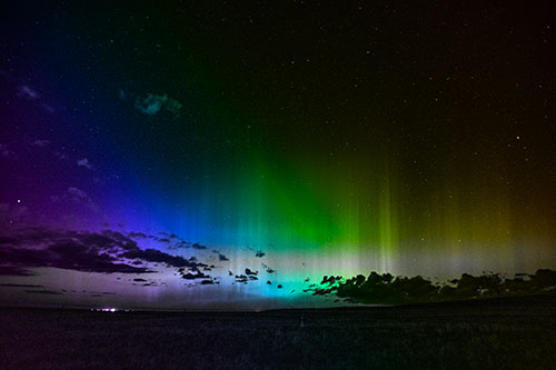 Northern Aurora Borealis Lights Up Night Sky (Rainbow Tone Photo)
